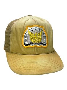 *PLEASE READ ENITRE DESCRIPTION AND REFER TO MEASUREMENTS BEFORE PURCHASING* Vintage 1989 Carhartt Embroidered Logo Trucker Snapback Hat OSFA MEASUREMENTS SIZE - One Size Fits Most All Hats Will Be Shipped In A Cardboard Box CONDITION: 3/4 General wear, fading found around. Creasing on brim and dome. Light marks found around. All flaws mentioned above can be seen in the product photos. CONDITION GUIDE 4/4 - A flawless garment. 3/4 - Minor cosmetic damage such as small marks or stains and/or mino Carhartt Logo, Carhartt Vintage, Dome Light, Boxing Conditioning, Snapback Hat, Trucker Cap, Snapback Hats, Caps Hats, Accessories Hats