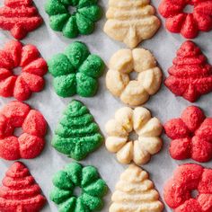 christmas cookies are arranged on a baking sheet