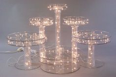 three tiered glass cake stand with lights