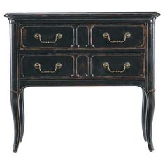 an old black dresser with brass handles on it's legs and drawers, against a white background