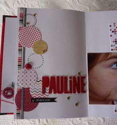 a close up of an open book with a child's face in the middle