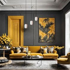 a living room filled with yellow and gray furniture next to a painting on the wall