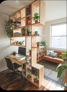 a home office with wooden shelving and plants