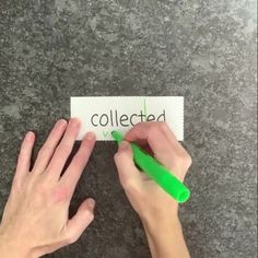 two hands holding a green marker over a piece of paper with the word collection written on it