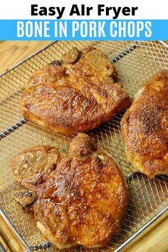 easy air fryer bone in pork chops on a cooling rack with text overlay