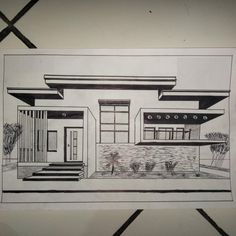 a drawing of a house that is in the process of being drawn by someone's hand