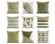 six pillows with different designs on them, each in green and white colors or shapes