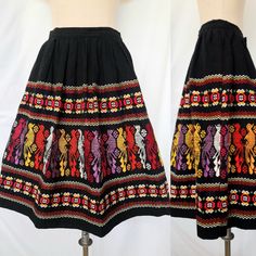 Vintage 70's mexican black skirt with a colourful tradicional embroidered pattern, showing a line of embroidered birds. The material is linen or a sturdy cotton, I am not sure,  and it features a narrow pleated waist and full skirt with metal clasp and side zipper. Inseam side pockets. No size tag, but it fits  a size S. Please check measurements for accuracy. Waist: 64cm/25.2" Hips free Length: 61cm/24" In very good vintage condition, just a few loose threads. For more information please feel f Summer Multicolor Embroidered Lined Skirt, Casual Embroidered Multicolor Skirt, Multicolor Embroidered Summer Skirt, Mexican Embroidered Skirt, Folk Style Multicolor Embroidered Skirt, Mexican Skirts, Peasant Skirt, Embroidered Bird, Bird Patterns