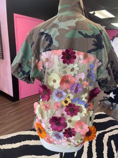 Biggest Trend of the season with the floral detailing on the back, makes them look as you walk away , loose style. Easy to pair with jeans or leggings. The flowers are like A 3D illusion popping off the jacket like a real garden effect. Vintage Camo , netted sheer back with floral detail . Trendy Spring Outerwear With Short Sleeves, Trendy Short Sleeve Spring Outerwear, Trendy Short Sleeve Outerwear For Spring, Trendy Summer Outerwear With Floral Print, Trendy Summer Floral Print Outerwear, Casual Floral Patchwork Outerwear For Spring, Trendy Short Sleeve Summer Outerwear, Bohemian Short Sleeve Outerwear For Fall, Bohemian Short Sleeve Spring Outerwear