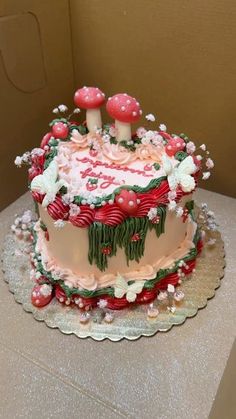 a decorated cake sitting on top of a table