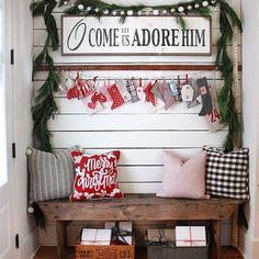 a wooden bench with christmas decorations on it