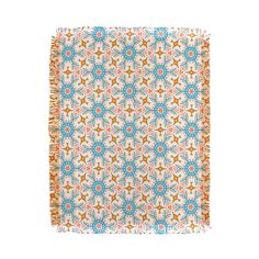 an orange, blue and white square rug with flowers on the bottom in different colors