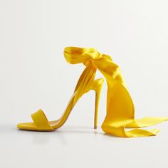 These open-toe sandals feature a sophisticated wrapped design that exudes timeless style. The vibrant yellow satin material adds an unexpected pop of color, perfect for any season. With a classy ankle strap for a secure fit and a high stiletto heel to elevate your look, these shoes are as comfortable as they are chic. Ideal for office wear, parties, or special occasions. Pair them with your favorite dress or tailored pants for a polished, fashion-forward ensemble. Walk confidently towards style Red Bottom Pumps, Red Carpet Party, Yellow Heels, Yellow Satin, Perfect Figure, Heels Classy, Ankle Wrap Sandals, Wrap Sandals, Satin Heels