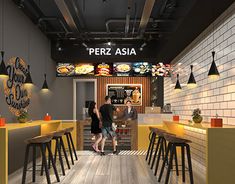 the interior of a restaurant with yellow counter tops and stools