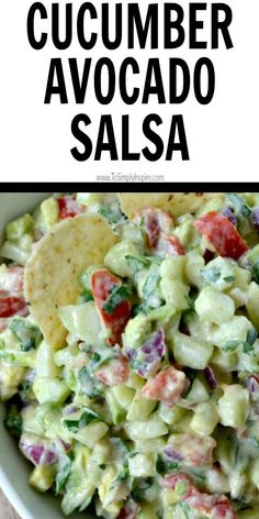 a bowl full of guacamole and tortilla chips with the words cucumber avocado salsa