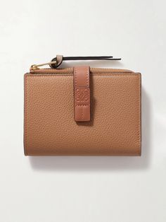 Loewe's wallet comes in muted shades of 'Light Caramel' and 'Pecan'. Crafted from textured and smooth leather, the bi-fold design unzips to reveal multiple slots for your credit cards and slip pockets for notes and receipts, all secured by a logo-embossed strap. Slip it into one of the label's 'Puzzle' bags. Jo Malone London, Card Holder Wallet, Ski Wear, Credit Cards, Smooth Leather, Women Collection, Leather Wallet, Shop Design, Slots