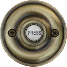 the word press is written on an antique brass door knob