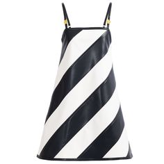 Step into bold sophistication with the Tempest White & Black Vegan Leather Mini Dress. Its striking diagonal stripe patchwork and luxurious vegan leather create a show-stopping look, while adjustable straps with signature Kargede embellishments add an artful touch. Designed for the woman who seeks originality, this mid-weight dress with its smooth cotton sateen lining is perfect for those transitional seasons and making a statement at any event. Slip On - Adjustable Straps Mini length 60% PU 35% Stocking Fillers For Her, Leather Mini Dress, Black Vegan, Diagonal Stripes, Gifts For New Mums, Pearl Jewellery Earrings, Fine Jewelry Gift, Independent Designers Fashion, Gifts For New Moms