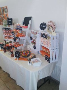 a table topped with lots of candy and candies