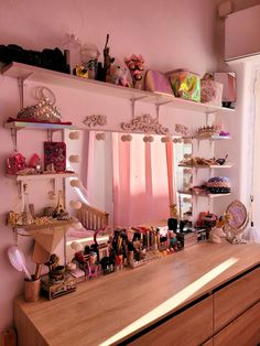 a dresser with lots of items on top of it