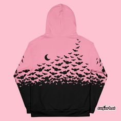 A cute pastel grunge hoodie with a cauldron of bats and crescent moon detail.This hooded sweatshirt looks great on both men and women.Perfect for people who love bats and looking cute.Runs large for women.Fits men true to size.Lined hoodSoftSofter brushed fleece insideHas a pocketPlus sizes availableOriginal artwork not available in storesSizing tip: Take a shirt that fits you the way you like, lay it flat and measure the width (from under one arm to under the other arm) and the length (from col Halloween Emo Style Long Sleeve Hoodie, Gothic Cotton Hoodie For Halloween, Gothic Cotton Halloween Hoodie, Halloween Hoodie Sweatshirt For Alternative Fashion, Halloween Emo Hooded Sweatshirt, Emo Hooded Sweatshirt For Halloween, Hooded Emo Sweatshirt For Halloween, Gothic Hooded Halloween Hoodie, Pink Halloween Sweatshirt For Streetwear