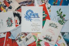 many christmas cards are piled on top of each other