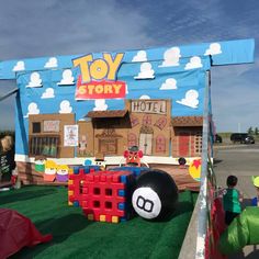 an outdoor play area with toys and people