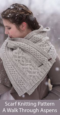 a woman wearing a scarf in the snow