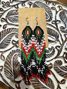 Beautiful handmade beaded earring i created would be a staple to your everyday outfit and the colors can be customizable to your likings.  I started my beading journey to reconnect with my Abenaki culture. Southwestern Beaded Earrings With Tassels For Festival, Traditional Fringe Beaded Drop Earrings, Southwestern Fringe Beaded Earrings As Gift, Southwestern Beaded Fringe Earrings As Gift, Southwestern Fringe Beaded Earrings For Gift, Traditional Beaded Fringe Chandelier Earrings, Handmade Southwestern Green Beaded Earrings, Southwestern Style Beaded Fringe Earrings For Gift, Southwestern Green Beaded Dangling Earrings