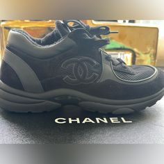 Used Women Chanel Trainers Suede Elegant Black Round Toe Sneakers, Black Sneakers For Streetwear, Stylish Black Sneakers For Streetwear, Elegant Black Evening Sneakers, Black Leather Evening Sneakers, Evening Black Leather Sneakers, Chanel Runners, Chanel Trainers, Black Leather Sneakers