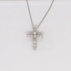 Simple natural diamond cross necklace- Metrica 14k gold diamond cut chain. An easy Lobster claw makes for safe and comfortable wear. The perfect pendant to wear anywhere. Also the perfect necklace to gift! Approx Gold weight: 1.80g Approx Diamond Weight: 11/ 0.30 cttw Available lengths: 16",17",18" Diamond Cut Cross Necklace In Diamond White, White Gold Round Diamond Cut Cross Necklace, Diamond White Diamond Cut Crucifix Necklace, Diamond White Crucifix Necklace With Diamond Cut, White Gold Cross Necklace With Diamond Cut Pendant, White Gold Diamond Cut Crucifix Necklace, White Gold Crucifix Necklace With Diamond Cut, White Diamond Cross Necklace With Diamond Cut, Fine Jewelry Diamond Cut Crucifix Cross Necklace