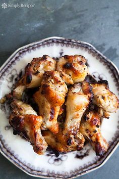 chicken wings on a plate ready to be eaten