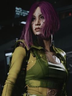 a woman with purple hair standing in front of a dark background and looking at the camera