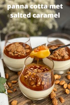 three small bowls filled with food on top of a wooden table