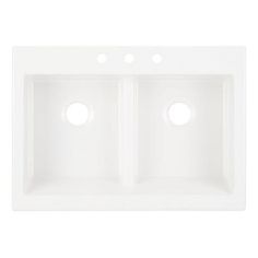 the double bowl kitchen sink is white and has three holes for two faucets