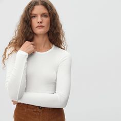 Meet your new favorite layer. Featuring a classic crew neckline, long fitted sleeves, and a snug fit throughout, the Pima Micro-Rib Long-Sleeve Crew is a go-to cold-weather essential. The best part? It’s made of our lightweight, fine-ribbed cotton with a touch of stretch that hugs in all the right places. Wear it on its own indoors, or layer it under your favorite sweater for added warmth all season long. Ribbed Fitted Long Sleeve Top For Layering, Classic Long Sleeve Stretch Top For Spring, Classic Stretch Long Sleeve Top For Spring, Long Sleeve Crew Neck Top With Ribbed Neckline, Fitted Fine Knit Long Sleeve Crew Neck Top, Classic Crew Neck Long Sleeve Top For Spring, Classic Long Sleeve Top For Spring, Fitted Long Sleeve Crew Neck Top For Layering, Fitted Long Sleeve Top With Ribbed Crew Neck