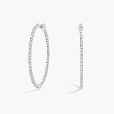 An elevated twist on a timeless piece, these 14k white gold diamond hoop earrings showcase 2 ct. tw. of French pave-set round diamonds intricately arranged in an eternity-inspired design. Diameter of hoop measures 1 1/2 inches. Wedding Ring Guide, Pearl Jewelry Gift, Gold Diamond Hoop Earrings, White Gold Hoops, Platinum Rose Gold, Engagement Rings Marquise, Gold Rings Fashion, Gold Pearl Necklace, Gold Pearl Earrings