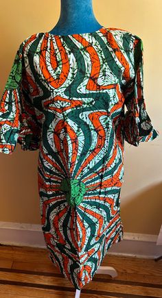 Ankara Dress for women, 100% Cotton, African dress, Ankara fabric, all event type, summer dress. African women dress, Nigerian Ankara dresses  * Extra Large Size (46 - 50) US Size 16 -18 * Zippered  Kindly allow a difference of the picture/pattern of your item(s) between the real-life image and the photographic image on the website. Care instructions: Hand wash in cold water- do not BLEACH  Return policy  1. Item is not used 2. Item is still in its original packaging. 3. Item is odorless  4. the item is not winked up  4. 5% restocking fee. Green Batik Print Maxi Dress For Summer, Green Batik Print Summer Maxi Dress, Multicolor Ankara Fabric Dress With Batik Print, Summer Ankara Fabric Maxi Dress, Fitted Green Tunic Dress, Green Fitted Tunic Dress, Ankara Fabric Beach Dress For Summer, Summer Beach Dress In Ankara Fabric, Traditional Multicolor Print Summer Dress