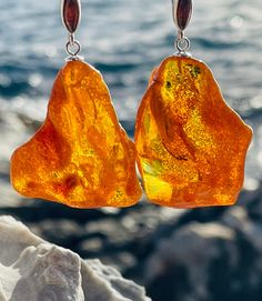 Earrings material and details : * Stone: Natural Baltic Amber * Metal: Sterling silver * Silver hallmark :Ag 925 * Weight: 11, 0 g * Earrings length : 5,5 cm * Color: Honey Baltic Amber Dangle Earrings, Baltic Amber Drop Earrings, Amber Dangle Earrings In Baltic Amber, Amber Teardrop Baltic Amber Earrings, Teardrop Baltic Amber Earrings In Amber, Amber Earrings, Baltic Amber, Chandelier Earrings, Sterling Silber