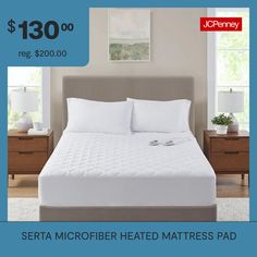 a bed with white sheets and pillows is on sale for $ 130 00 reg $ 200 00