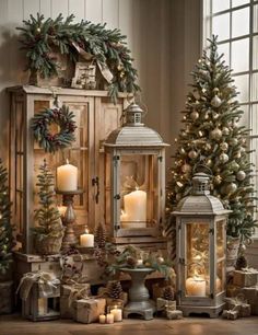 christmas decorations with candles and ornaments around them