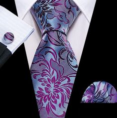 Looking for an accessory that effortlessly combines sophistication and style? Feast your eyes on our Men's Silk Necktie Pocket Square Cufflink Set in captivating purple! It guarantees a non-deformed, soft, and authentically polished appearance since it is made from opulent silk utilizing the Jacquard weaving technique. This set includes a tie that measures 59 by 3.15 inches which will help you embrace your inner spiffy, a pocket square that is 9 by 9 inches, and cufflinks that have a stylish 0.55-inch circle. Make a statement with your attire for formal gatherings, such as proms, weddings, and banquets. The elaborate designs make you the center of attention at any gathering and go beautifully with suits and tuxedos. This Necktie Pocket Square Cufflink Set will add flair to your closet and Classic Purple Adjustable Suit And Tie Accessories, Elegant Lavender Suit And Tie Accessories For Business, Purple Ties As Gifts, Classic Purple Ties As Gifts, Formal Purple Tie, Elegant Purple Tie For Office, Elegant Purple Office Ties, Tiffany's Bridal, Best Dressed Man