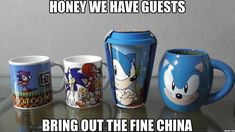 there are four sonic mugs on the table