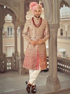 Mark your appearance by donning this ombre pink sherwani made of art silk. Traditional themed zari, thread embroidery with stones, and sequin decoration work were used to create this piece. Designed with a mandarin collar, a front opening, and long sleeves. Paired with art silk pants in white. Please keep in mind that some color discrepancies may occur due to photographic reasons. It is possible for measurements to vary by up to 1 inch. .Elegant sherwani for groom, groom sherwani, sherwani for m Groom Dress For Wedding, Jodhpuri Sherwani, Pink Sherwani, Sherwani For Groom, Men Sherwani, Indian Groom Dress, Indian Wedding Clothes For Men, Groom Sherwani, Sherwani For Men Wedding