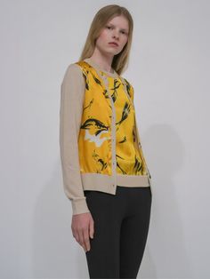 Rosetta Getty's Silk Inset Cardigan is designed with a slim crewneck silhouette and features a front panel of Pre-Fall 24’s Painted Birds Printed Satin. This elegant mix of lustrous silk and knitwear lends versatility to the silhouette, which is ideally paired with the matching T-shirt as a twinset. Woven in a silk-based blend of three luxury fibers, this yarn is soft and insulating. It knits to a smooth and lustrous finish that is ideal for layering while offering a soft feel against the skin. Painted Birds, Fall Cardigans, Silk Cardigan, Rosetta Getty, Fall 24, Denim T Shirt, Beige Cardigan, Cotton Cardigan, White Cardigan