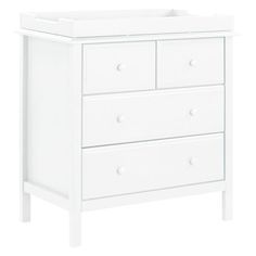 a white baby crib with three drawers