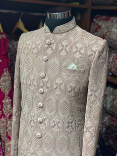 Sienna brown excellent detailing of vintage motifs accentuated with thread and sequence details with mandarin collar in cut dana and zardozi work. Available with matching churidar. Size: 38,44 Ready to Ship! Straight Kurta Bandhgala With Intricate Embroidery On Jamawar, Straight Kurta Bandhgala With Intricate Embroidery, Traditional Semi-stitched Bandhgala With Intricate Embroidery, Fitted Raw Silk Bandhgala With Intricate Embroidery, Festive Semi-stitched Bandhgala With Intricate Embroidery, Festive Semi-stitched Intricately Embroidered Bandhgala, Fitted Jamawar Churidar With Intricate Embroidery, Semi-stitched Bandhgala With Dabka Work For Reception, Intricate Embroidered Fitted Jamawar Churidar