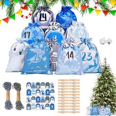 a bunch of bags with numbers on them sitting next to a christmas tree and decorations