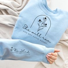 She Will Run and Not Grow Weary Sweatshirt, Isaiah 40:31, Bible Sweatshirt, Jesus Apparel, Christian Gift, Faith,Boho Scriptures,Wildflower  🌟 WELCOME TO MODE PARAGON! 🌟 🤗 Are you in search of delightful, personalized, and cozy outfits for your loved ones? You're in the right place! 🌈✨ At Mode Paragon, we prioritize customer service and are here to assist you every step of the way. If you have any questions, don't hesitate to reach out - we're always ready to respond promptly! 💖 🛍️ ORDERIN Run And Not Grow Weary, Jesus Apparel, Cozy Outfits, Isaiah 40 31, Toddler Hoodie, Christian Gifts, American Made, Hobbies, Customer Service