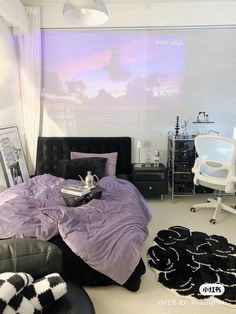 a bed room with a neatly made bed next to a desk and chair in front of a window